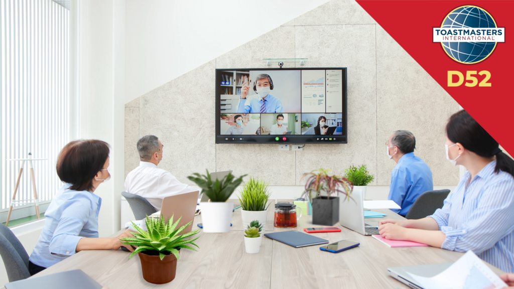 Picture of people conducting a hybrid meeting